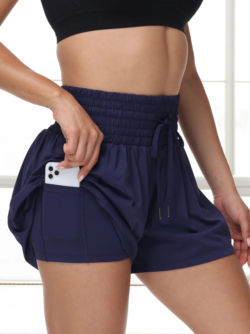 High-waisted 2 In 1 Athletic Shorts for Women, perfect for yoga, running, and casual summer outings with pockets.